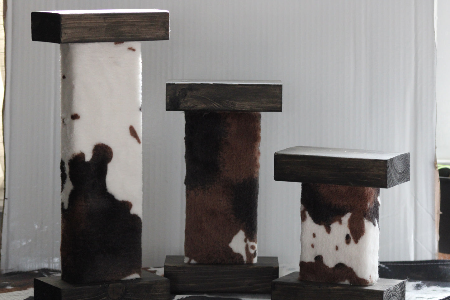 COWHIDE COVERED CANDLE HOLDERS