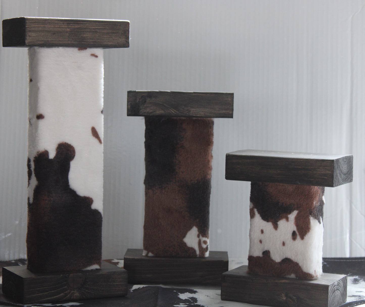 COWHIDE COVERED CANDLE HOLDERS